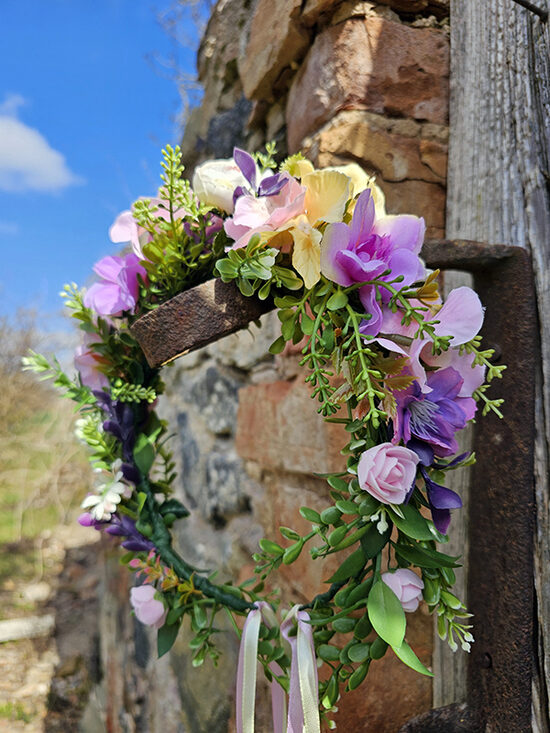 Artificial flower hair wreath - purple with yellow and white