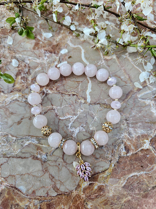 Natural stone bead bracelet - pink with gold color elements and leaf pendant 