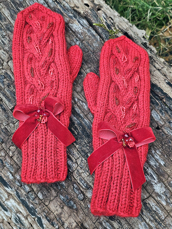 Knitted mittens with braids and beads - red