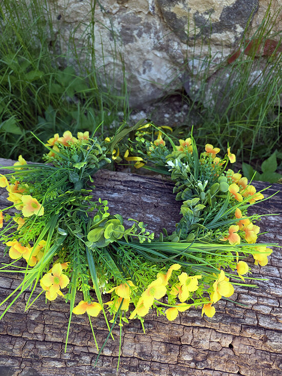Artificial flower hair wreath - yellow with small flowers and greenery