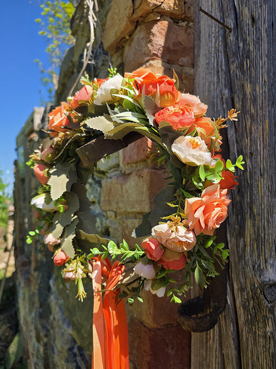 Artificial flower hair wreath - orange with roses 