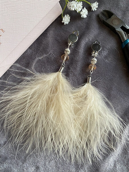 Clip earrings with feathers - beige yellow with silver colour fitting 