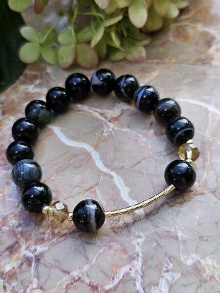 Natural stone bead bracelet - black with gold color elements 