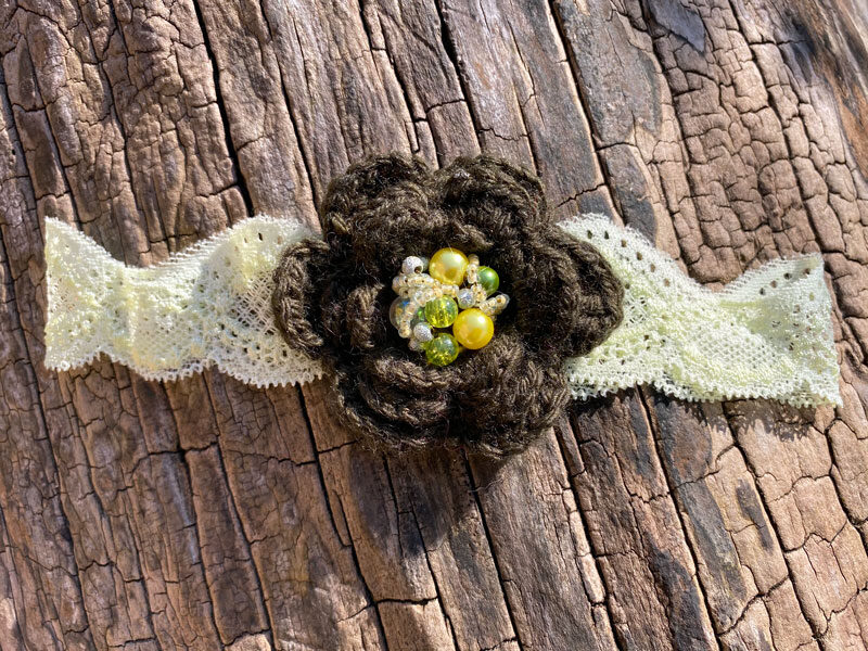 Lace headband with crocheted flower - dark green 