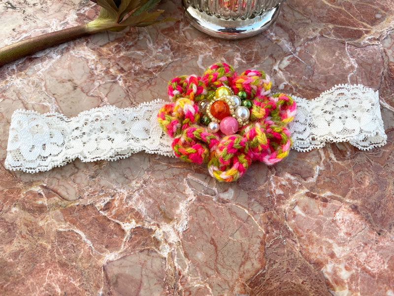 Lace headband with crocheted flower - variegated 