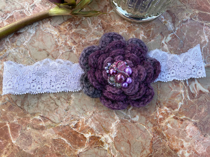 Lace headband with crocheted flower - purple 