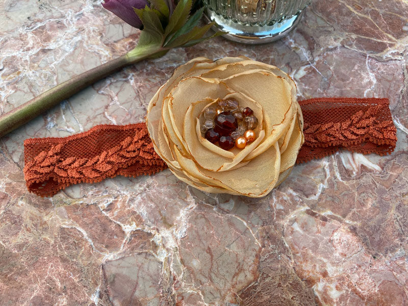 Lace headband with fabric flower - rusty brown 