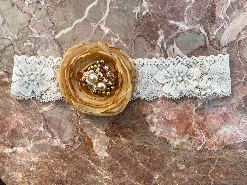 Lace headband with fabric flower - gold colour 